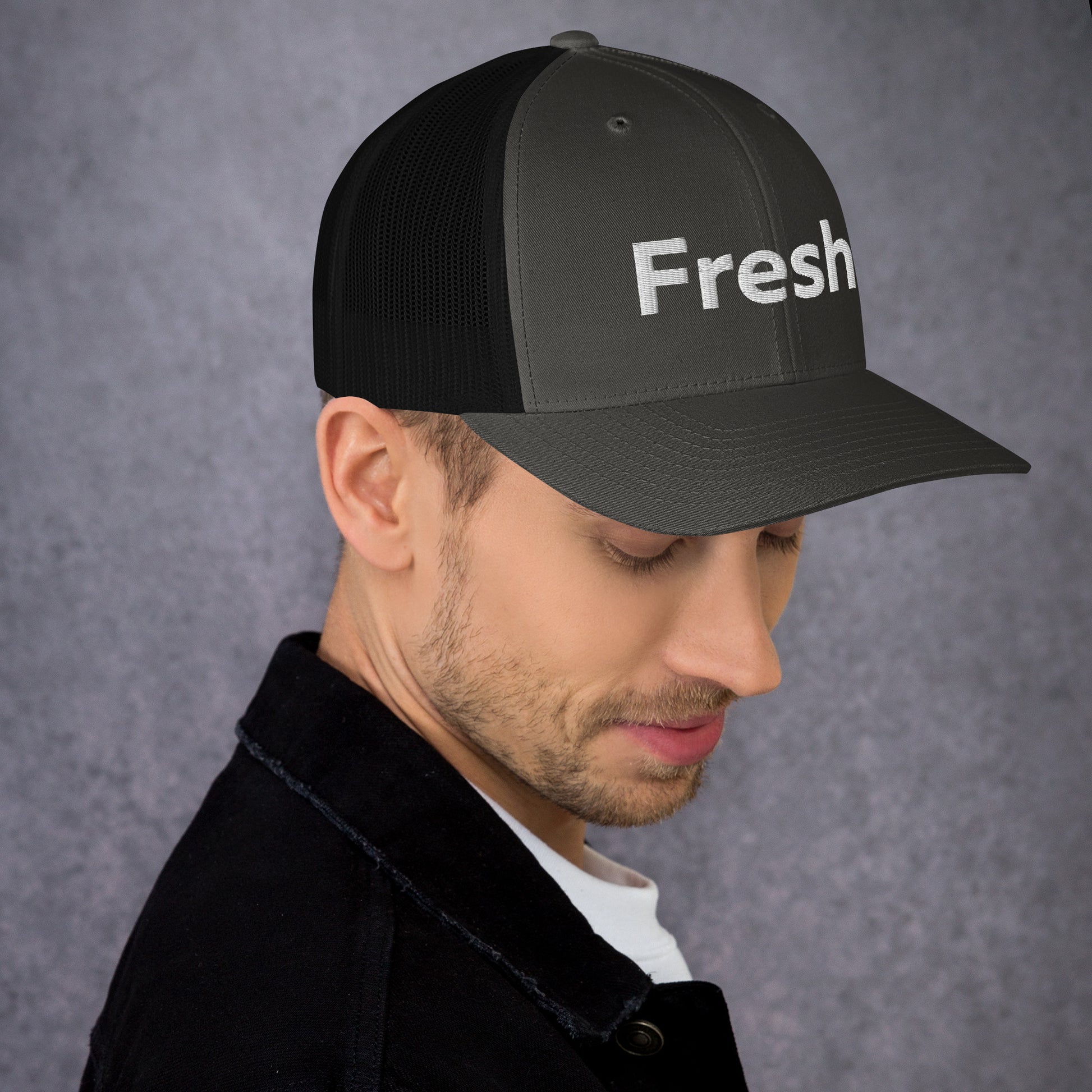 Looking for a hat that combines style and comfort? Look no further than the Fresh Hat! Color: Charcoal and Black 