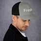 Looking for a hat that combines style and comfort? Look no further than the Fresh Hat! Color: Heather and Black
